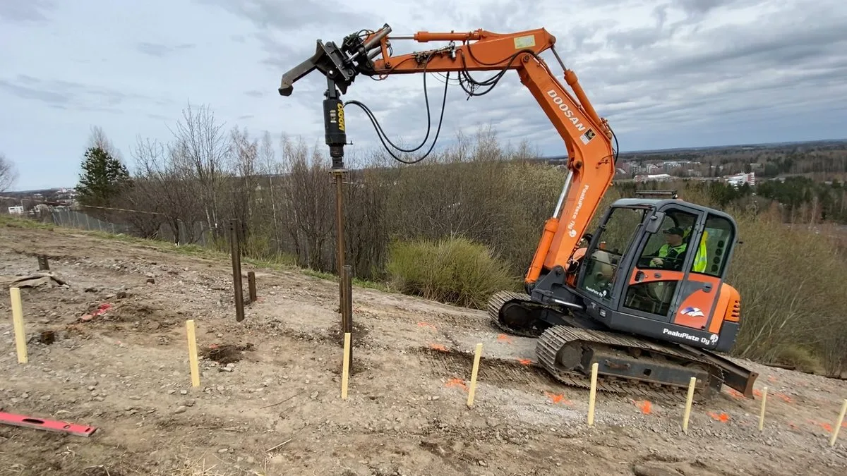 Screw pile installation on steep hillside for Jätemäki fitness stairs, Helsinki
