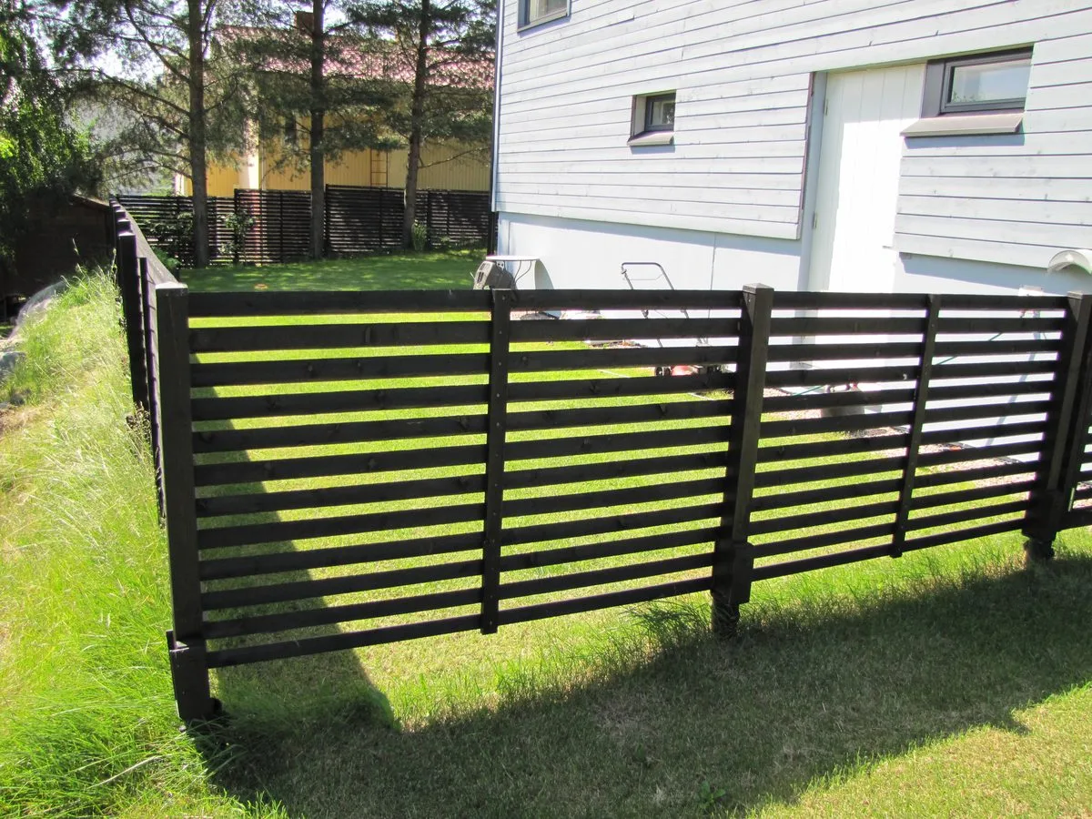 Fence posts on screw pile foundations