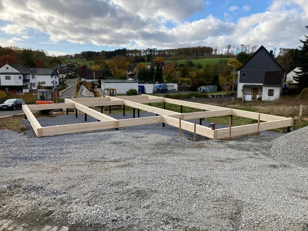 Residential house foundation on screw piles