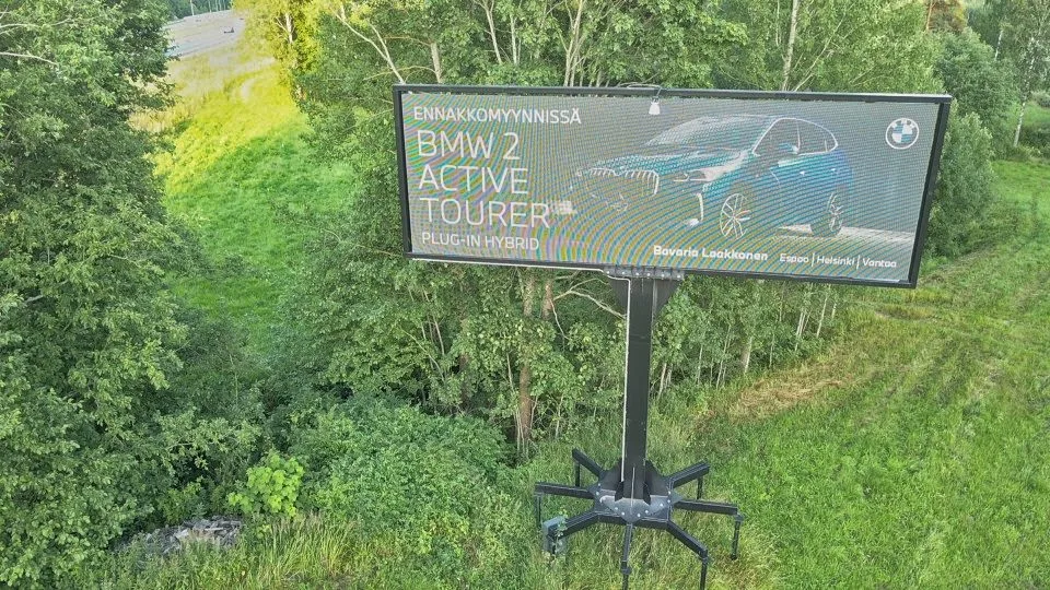 Road sign mounted on screw pile foundation