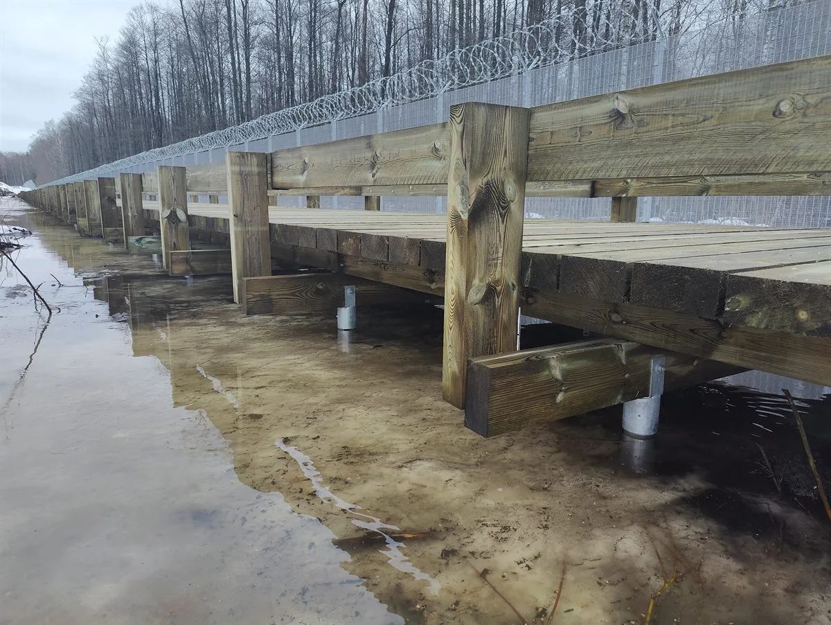 Wetland boardwalk on screw pile foundations, Latvia